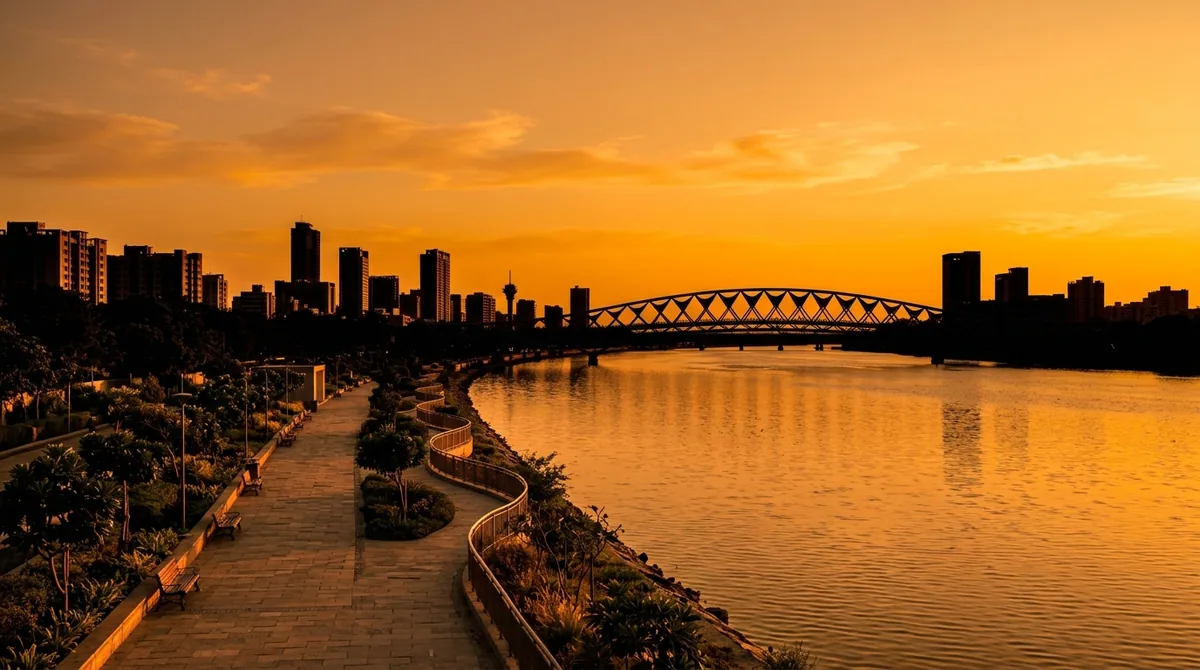 The Sabarmati riverfront promenade in Ahmedabad at golden hour
