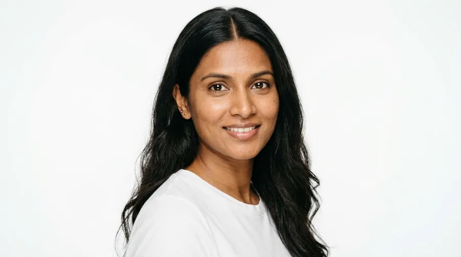 Portrait of a woman in her twenties with full loose hair