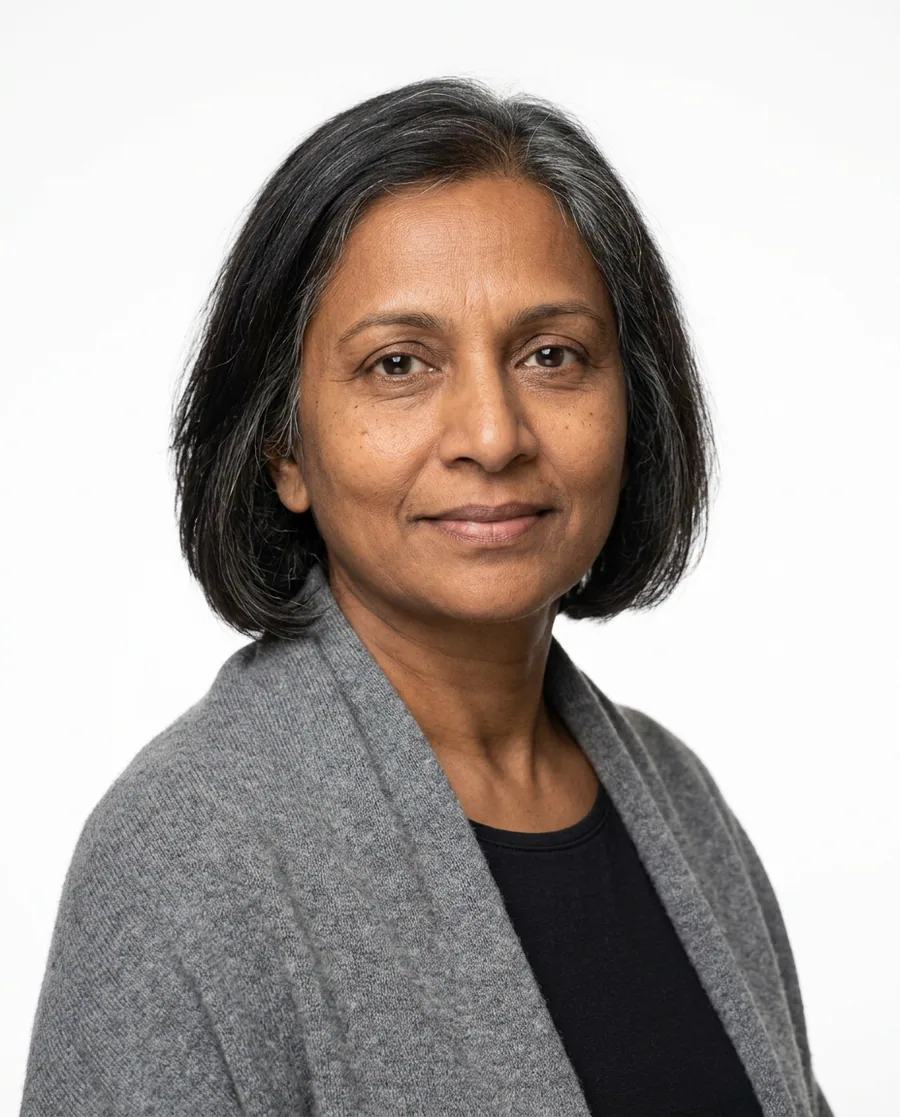 Portrait of a woman in her fifties wearing a hair system